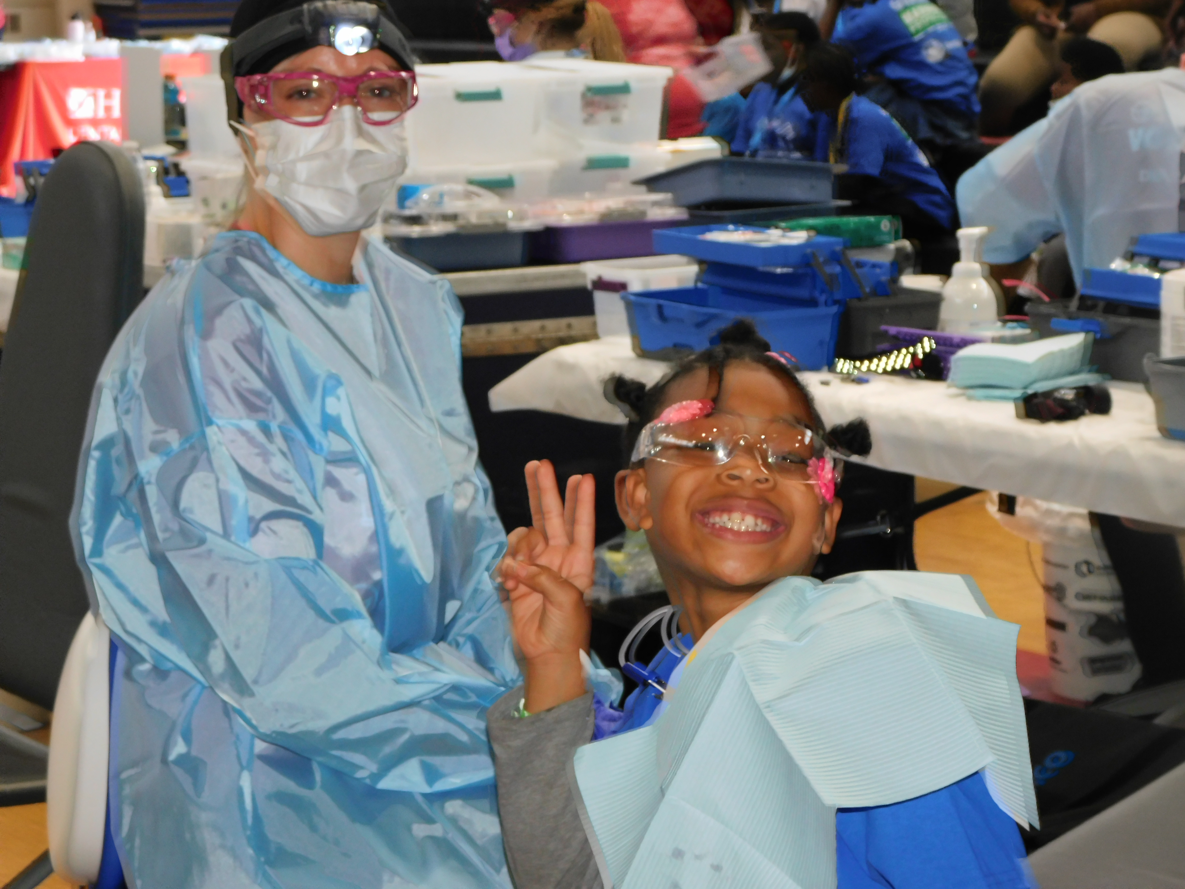 Dentist treating Mission of Mercy patient